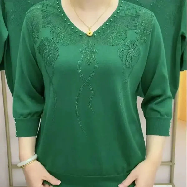 Renée – haftowany sweter z dekoltem w serek