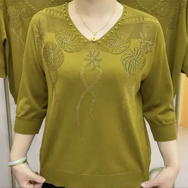 Renée – haftowany sweter z dekoltem w serek