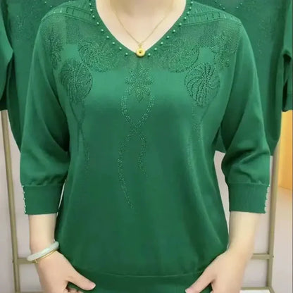 Renée – haftowany sweter z dekoltem w serek